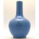 A Chinese pale blue glazed bottle vase, early 20th century, 34 cm h.
