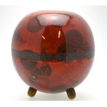 A Japanese spherical cloisonne vase standing on three small feet,