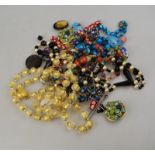 A lot containing vintage jewellery including various Venetian bead necklaces, glass beads,