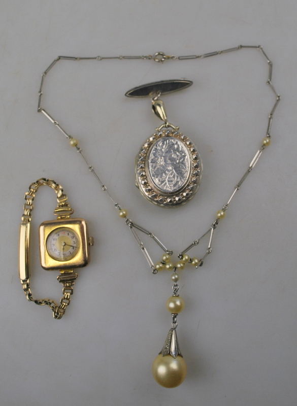 A lady's 9ct square cased wristwatch having circular dial on gilt metal strap to/w a silver locket