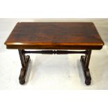 A Victorian rosewood library/centre table, the rectangular top over a plain frieze,