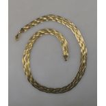 A six-row plaited mesh style necklace,