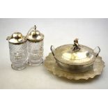 A Victorian cut glass butter dish with engraved silver cover and stand and parrot finial, Martin,