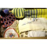 A box of assorted table linen to include embroidered tablecloths and napkin sets, crocheted doilies,