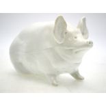 A Wemyss blanc de chine seated pig, impressed mark, 9.