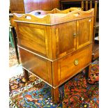 A 19th century mahogany tray top commode with pair of cross-banded doors over a deep drawer,