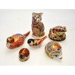 Six Royal Crown Derby paperweights decorated in the Imari style comprising a frog, seated cat,