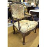 An 18th/19th century carved walnut framed fauteuille with tapestry back and serpentine seat