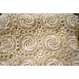 A hand-crocheted mocha cotton bedspread, made in 1952,