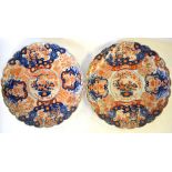 Two Japanese Imari dishes of Kikugata form, decorated with flower arrangements, Meiji period, 46.