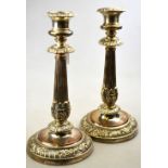 A pair of Matthew Boulton Old Sheffield Plate candlesticks with foliate and gadrooned decoration,