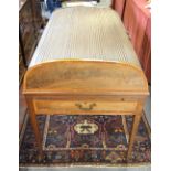 A George III mahogany full tambour top writing desk in the Hepplewhite manner,