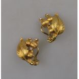 A pair of matt finish spray-style textured leaf and bud earrings,