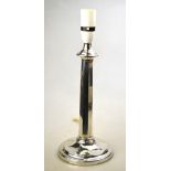A loaded silver table lamp with octagonal tapering pillar and circular base, Frank Cobb & Co. Ltd.