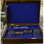 A Walker & Hall oak canteen of silver flatware for six, 28 pieces including four tablespoons,