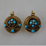 A pair of Victorian target style drop earrings, set with turquoise and Etruscan-style decoration,