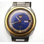 A quantity of ladies' and gentlemen's wristwatches, including Seiko 5 Automatic with blue dial,