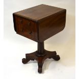 A Victorian mahogany drop leaf work table with two drawers to one end opposing dummy fronts,