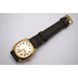 An Asprey gentleman's 9ct gold wristwatch, the silvered dial with subsidiary seconds hand,