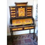 A late 19th century French pictorial polychrome decorated walnut cylinder top writing desk,