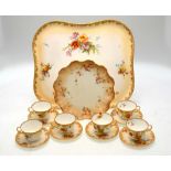 A Royal Doulton Burslem cabaret set, blush ground decorated with floral sprays and gilded borders,