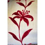 A pair of lined and inter-lined natural linen ground curtains with red cut velvet lily design,