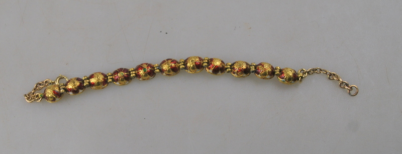 An Indian gold bracelet set with coral, pearl, chrysoberyl cat's eye, ruby, diamond, tourmaline, - Image 2 of 2