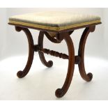 A Victorian rosewood framed stool with half overstuffed fabric seat raised on four scroll legs