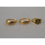 Three yellow metal rings, two set with small old cut diamonds and one initialled signet ring,