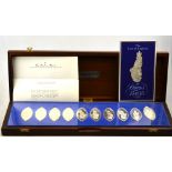 A Danbury Mint limited edition cased set of ten silver ingots of navette form - 'The Queen's
