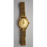 A lady's 9ct gold Omega wristwatch on flexible mesh bracelet strap, Birmingham 1965, 29.