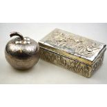 An Oriental white metal pot and cover in the form of a fruit, with engraved decoration,