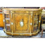 A Victorian ormolu mounted and Paris porcelain panelled burr walnut credenza,