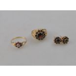 A garnet and diamond cluster ring and garnet cluster earrings to/w garnet cluster ring with rope