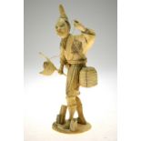A Japanese Meiji period sectional carved ivory Okimono, fisherman with catching net (pole missing),
