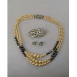 A double-string simulated pearl and haematite bead necklace with Art Deco paste-set clasp,