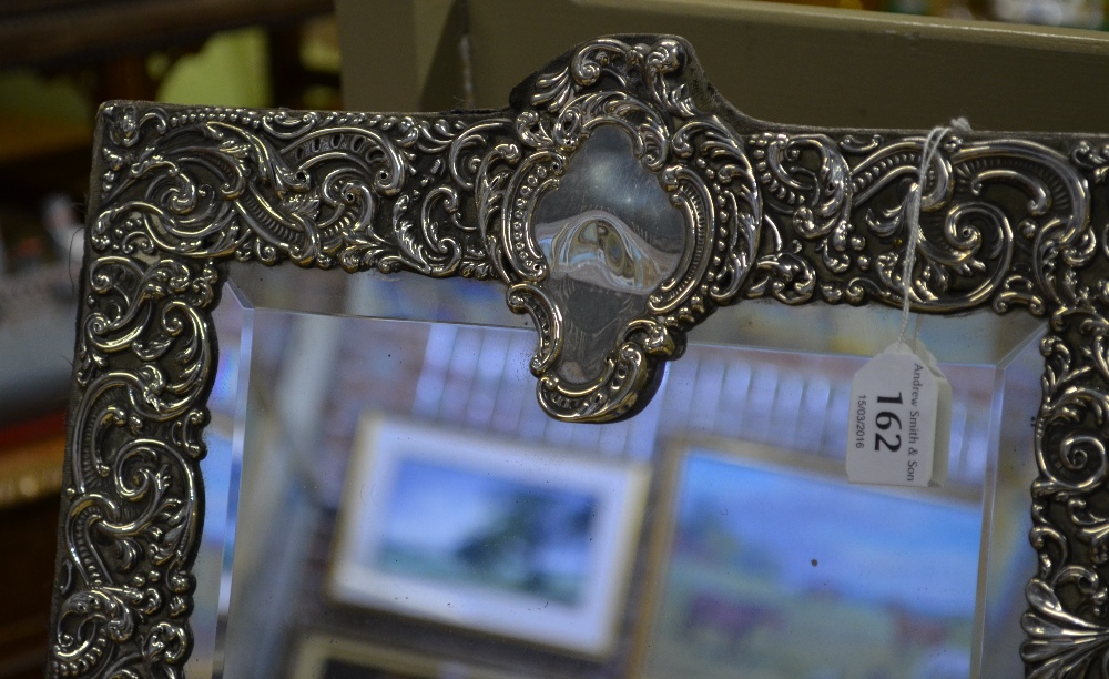 Large Victorian silver-faced easel toilet mirror with bevelled plate surmounted by rococo cartouche, - Image 2 of 2