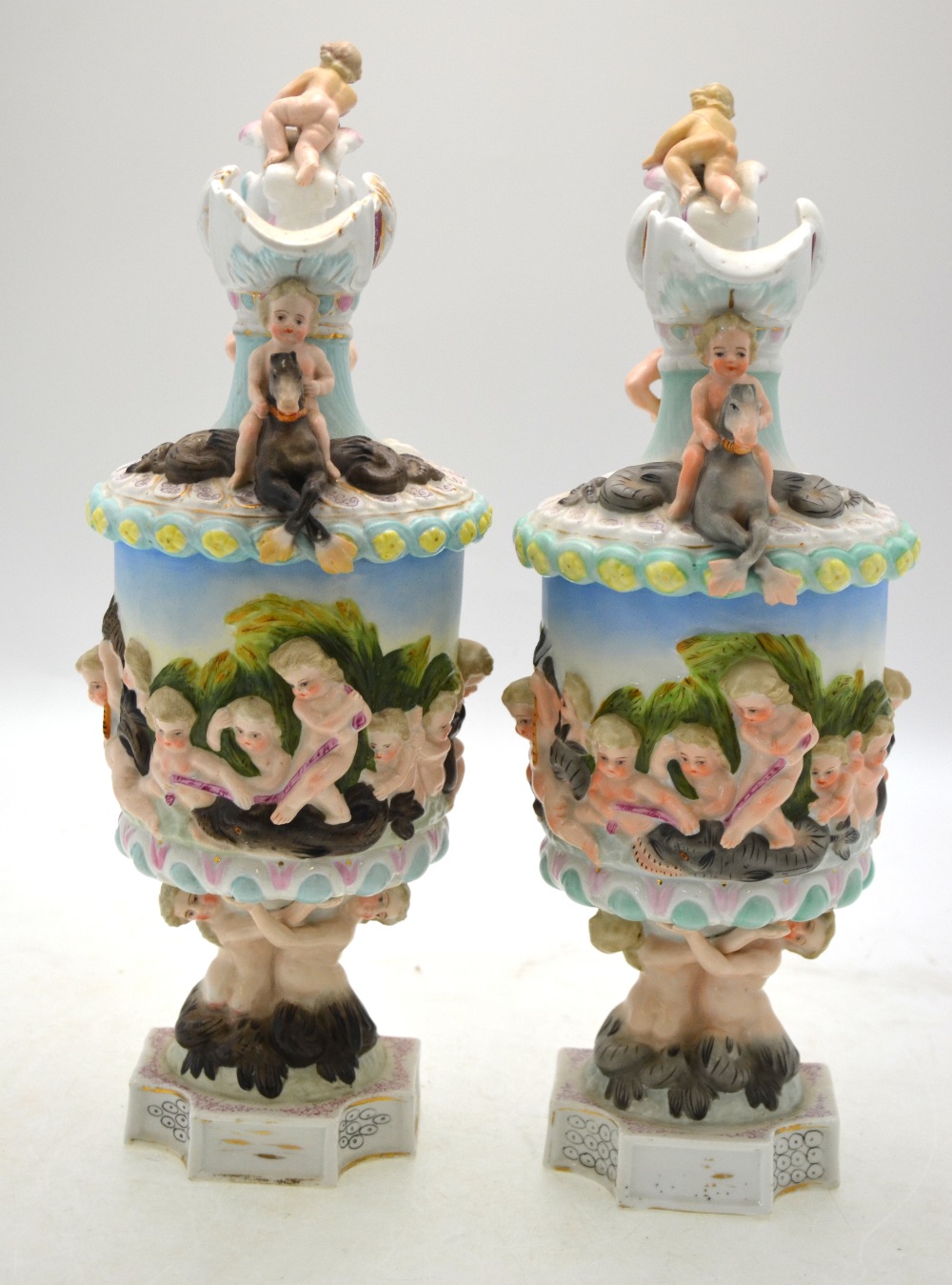 A continental pair of porcelain wine fla