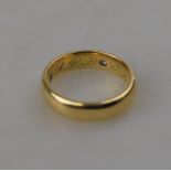 A 22ct yellow gold D -shaped wedding ban