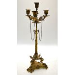 A 19th ormolu candelabra in the Etruscan