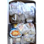 Two boxes of loose World postage stamps - mostly sorted and bagged (2)