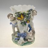 A 19th century porcelain vase in the form of a forget-me-not and butterfly decorated cornucopia