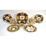 A collection of Victorian Ridgway dessert wares: Two sauce tureens with fixed stands and covers,