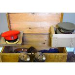 A painted pine chest containing military items to include a pair of black leather boots with boot