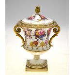 A Royal Crown Derby twin-handle urn and cover profusely painted with polychrome floral sprays and