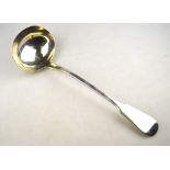 An early Victorian Scottish silver fiddle pattern soup ladle, Andrew Wilkie,