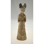 A Chinese Tang standing funerary figure of a court lady, vestiges of cold pigment,