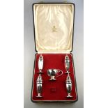 A cased silver five-piece condiment set of octagonal baluster form, Viners,