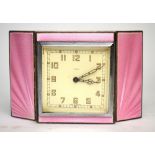 An Art Deco silver and pink basse-taille enamel clock with engine-turned decoration, Adie Bros.