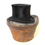 A black silk top hat, Woodrow, 46 Piccadilly, London retailed by George Brown & Co. Ltd.